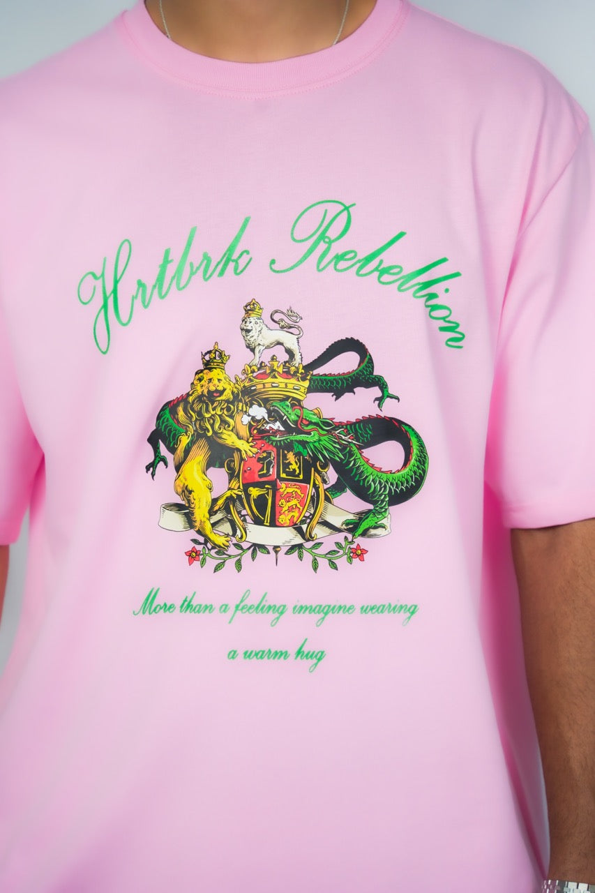 a pink shirt with a green bold design that says "more than just a feeling imagine wearing a warm hug" , this design is a Calgary fashion brand for men.